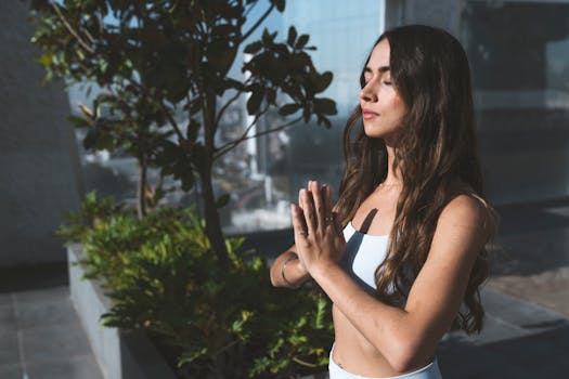 a person meditating in nature