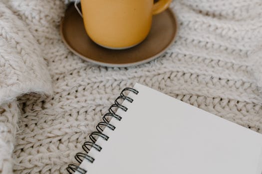 cozy journaling setup with a cup of tea