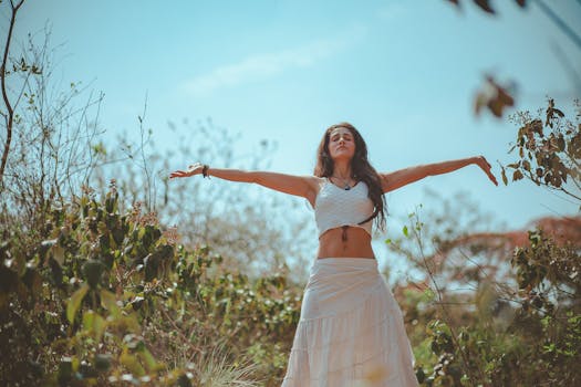 person meditating outdoors