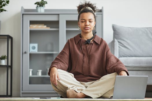 a person meditating in a peaceful setting