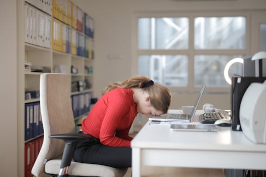 tired freelancer at desk