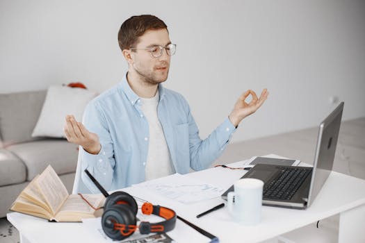 freelancer meditating at desk